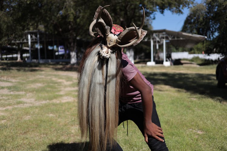 Man Wearing A Mask And Celebrating The Day Of The Dead In Mexico 