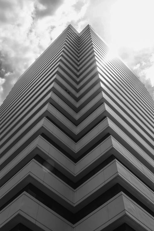 Free Low-Angle Shot of a Concrete Building Stock Photo