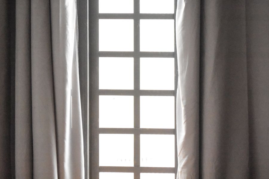 Window with sheer curtains letting in natural light