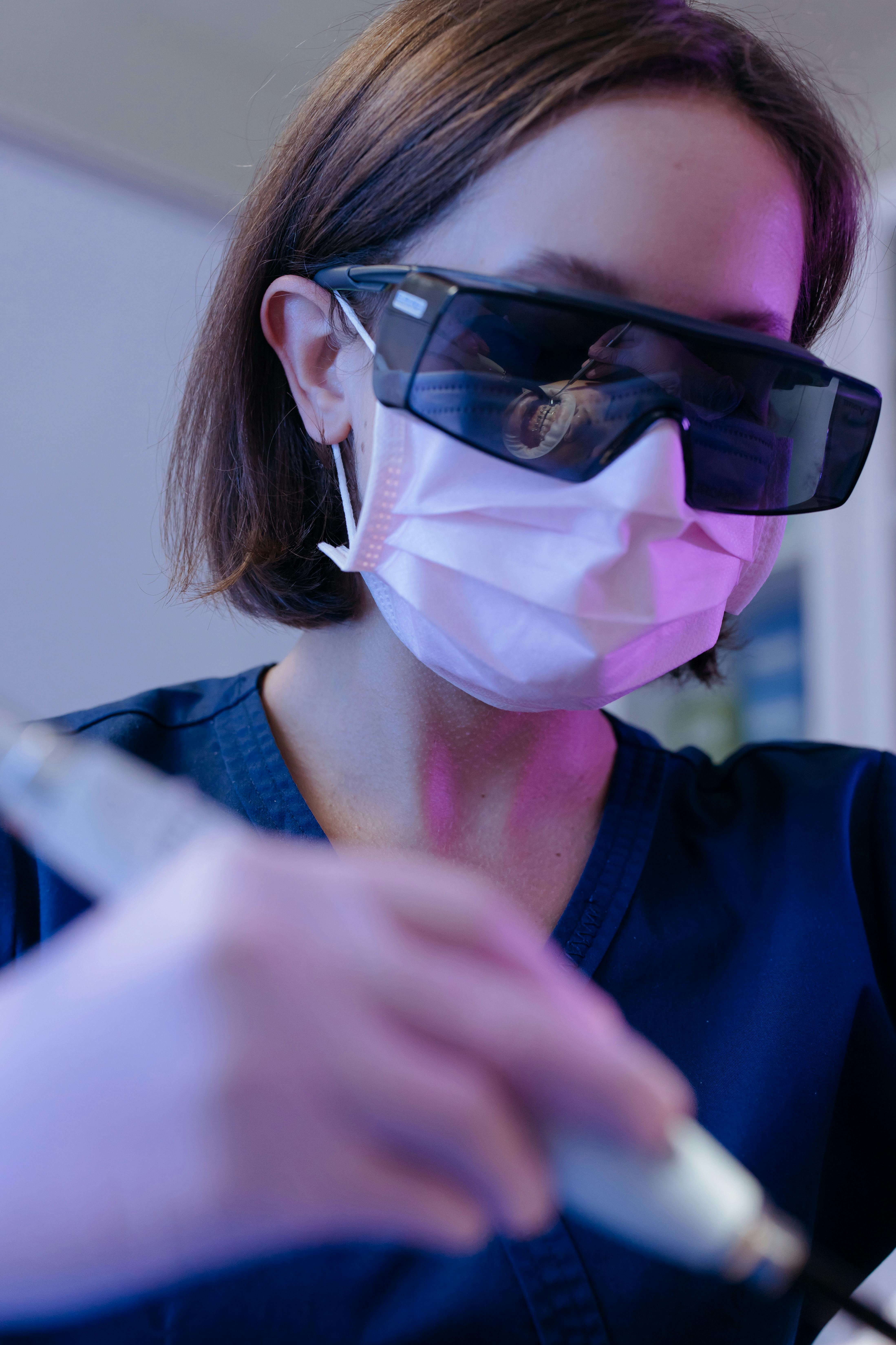 Dentist wearing Facemask and Eye Protection · Free Stock Photo