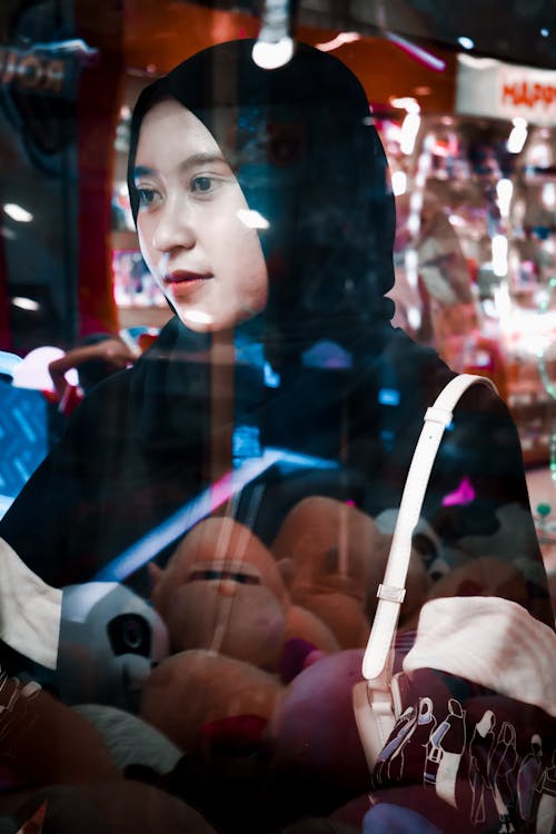 Free stock photo of against the light, arcade game, asian model Stock Photo