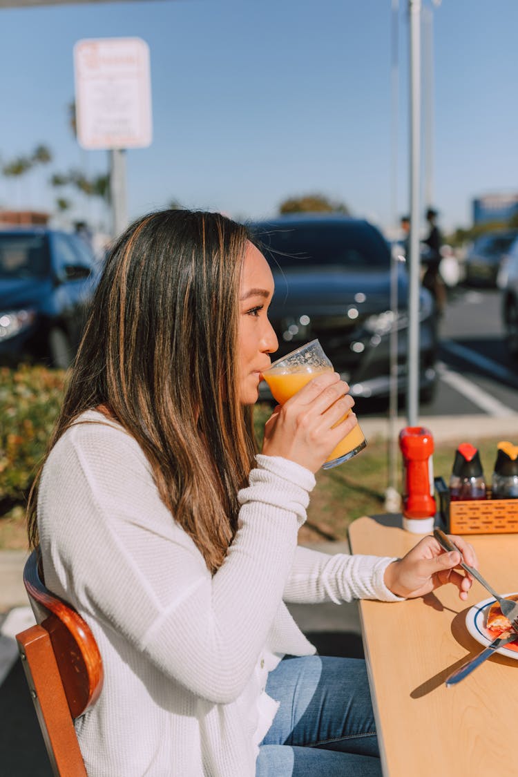 Woman Drinking Juice 