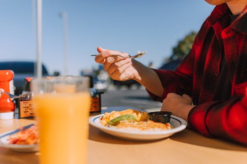 Free Person eating a Delicious Breakfast  Stock Photo