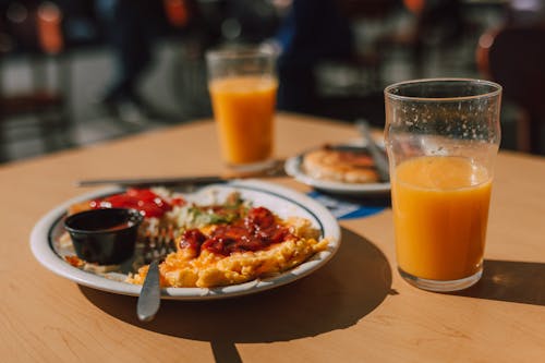 Free A Food in the Plate with Glass of Juice Stock Photo