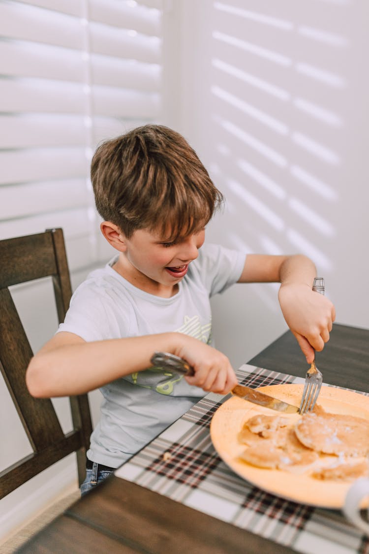 Boy Eating Breakfast