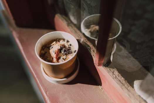 Disposable Cup filled with Oatmeal 