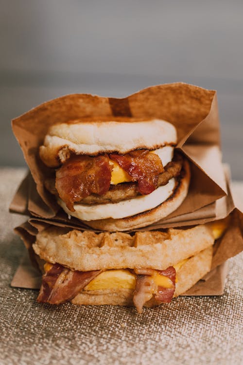 Free Breakfast Bacon Burger and Bacon Waffle Sandwich Stock Photo