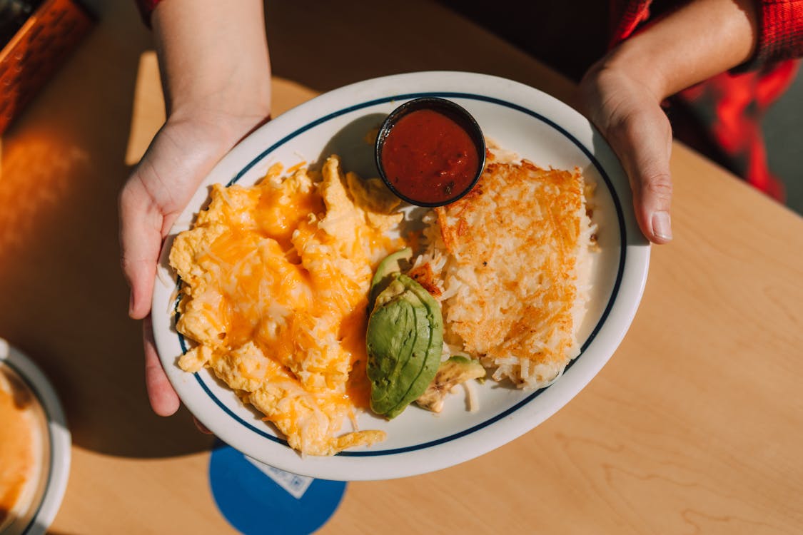 Free Plate of Eggs and Hash Browns Stock Photo