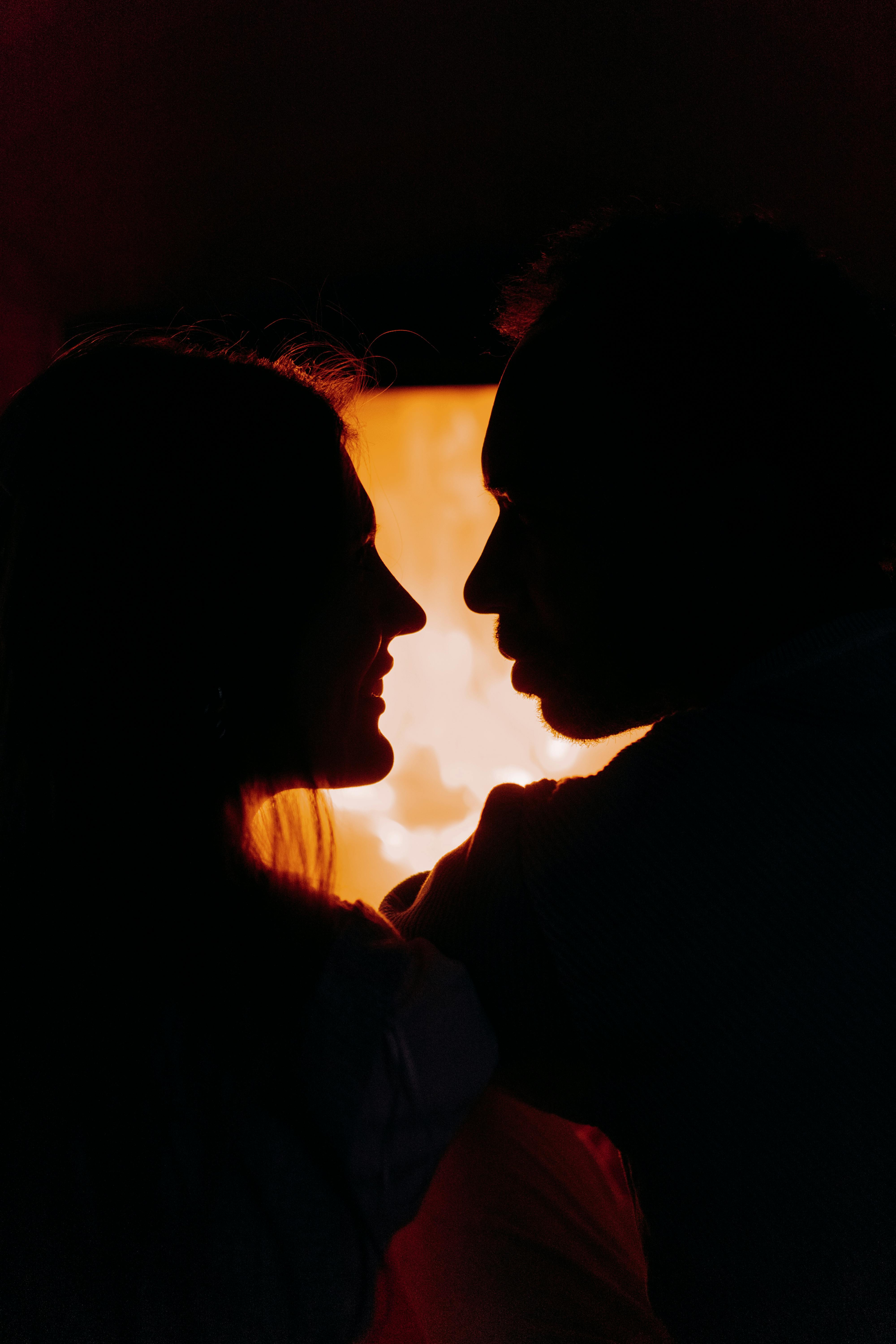 Couple in love, profile silhouettes close to each other, beautiful