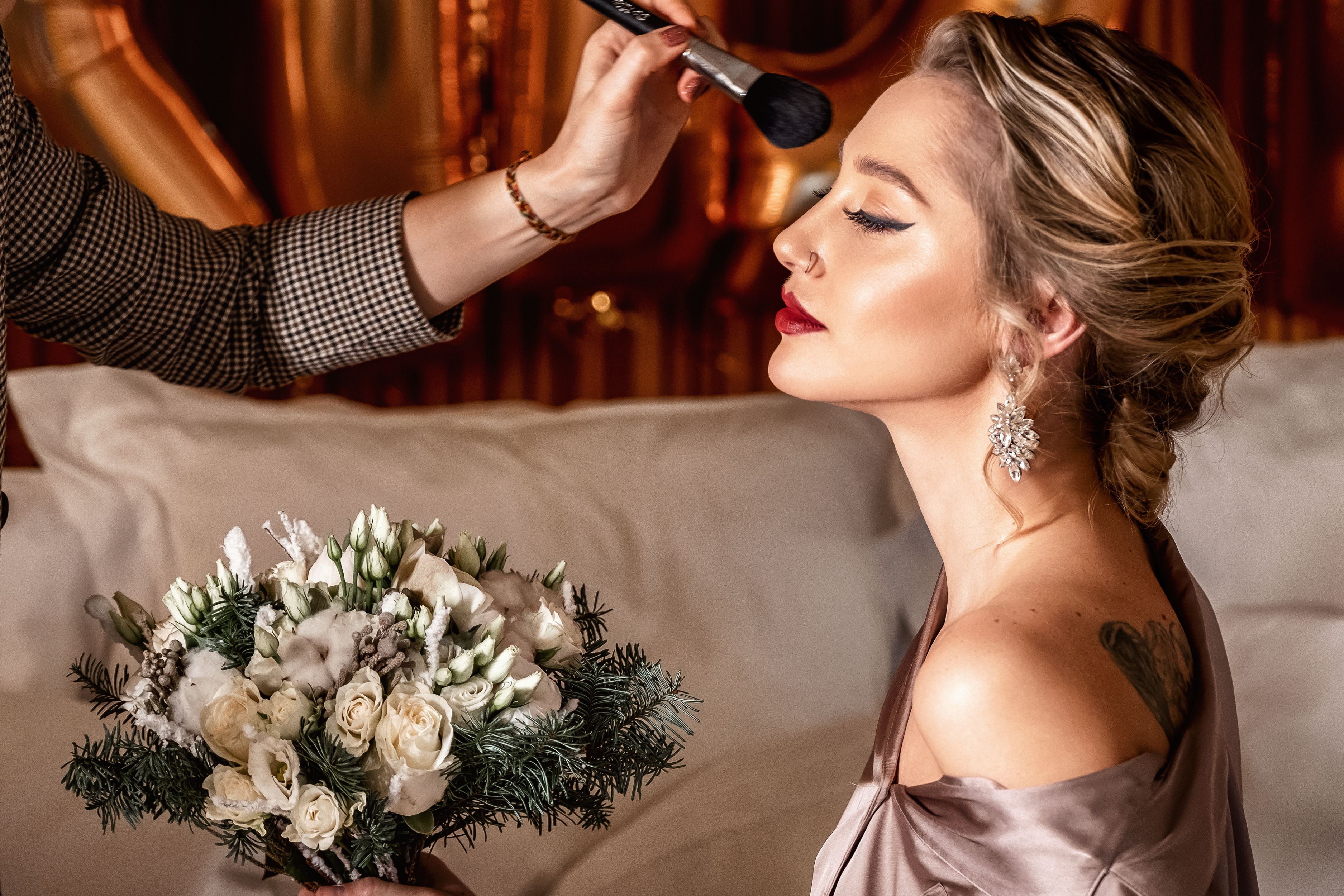 Capturing a bridal moment with elegant makeup and a stunning bouquet. Perfect for wedding inspiration.