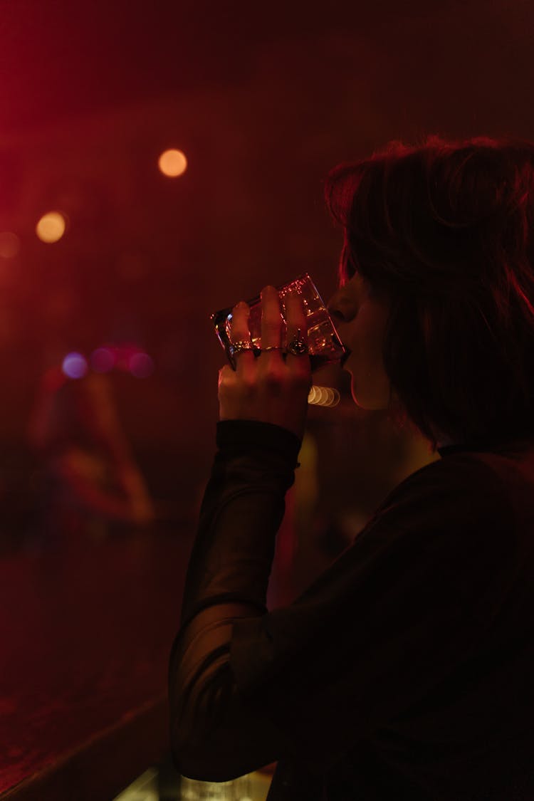 A Woman Drinking Alcohol