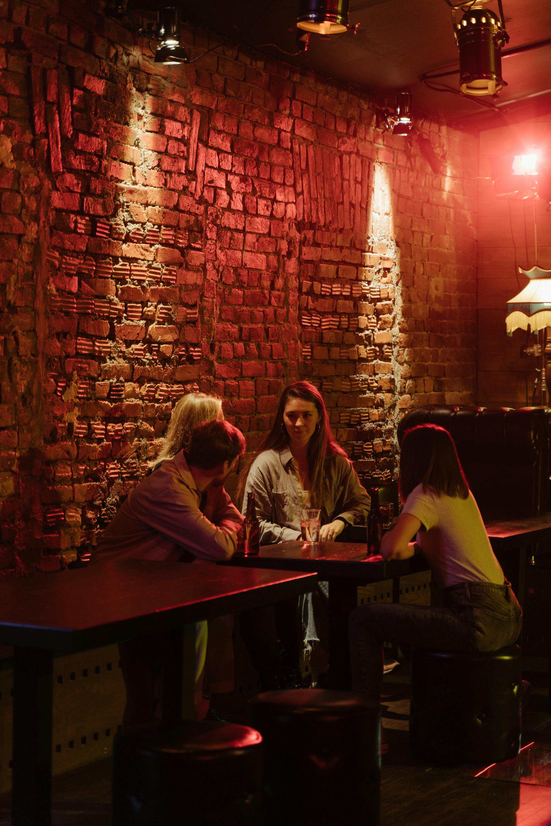 a people drinking in the bar