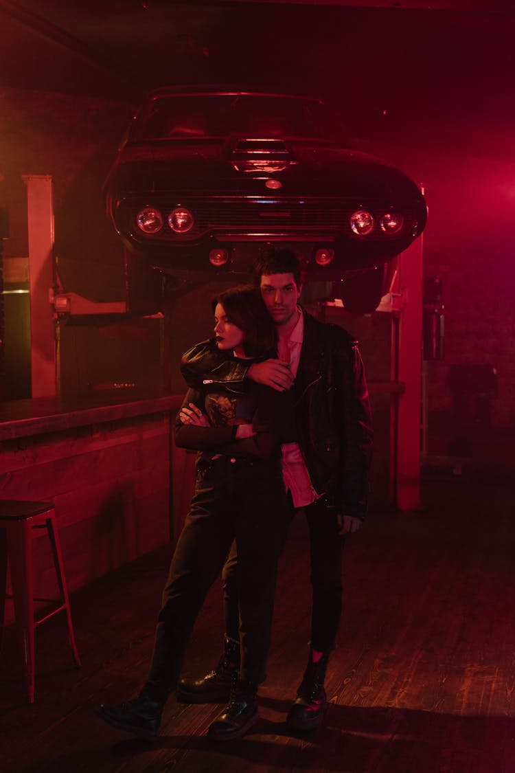 Photo Of A Couple Posing In A Bar