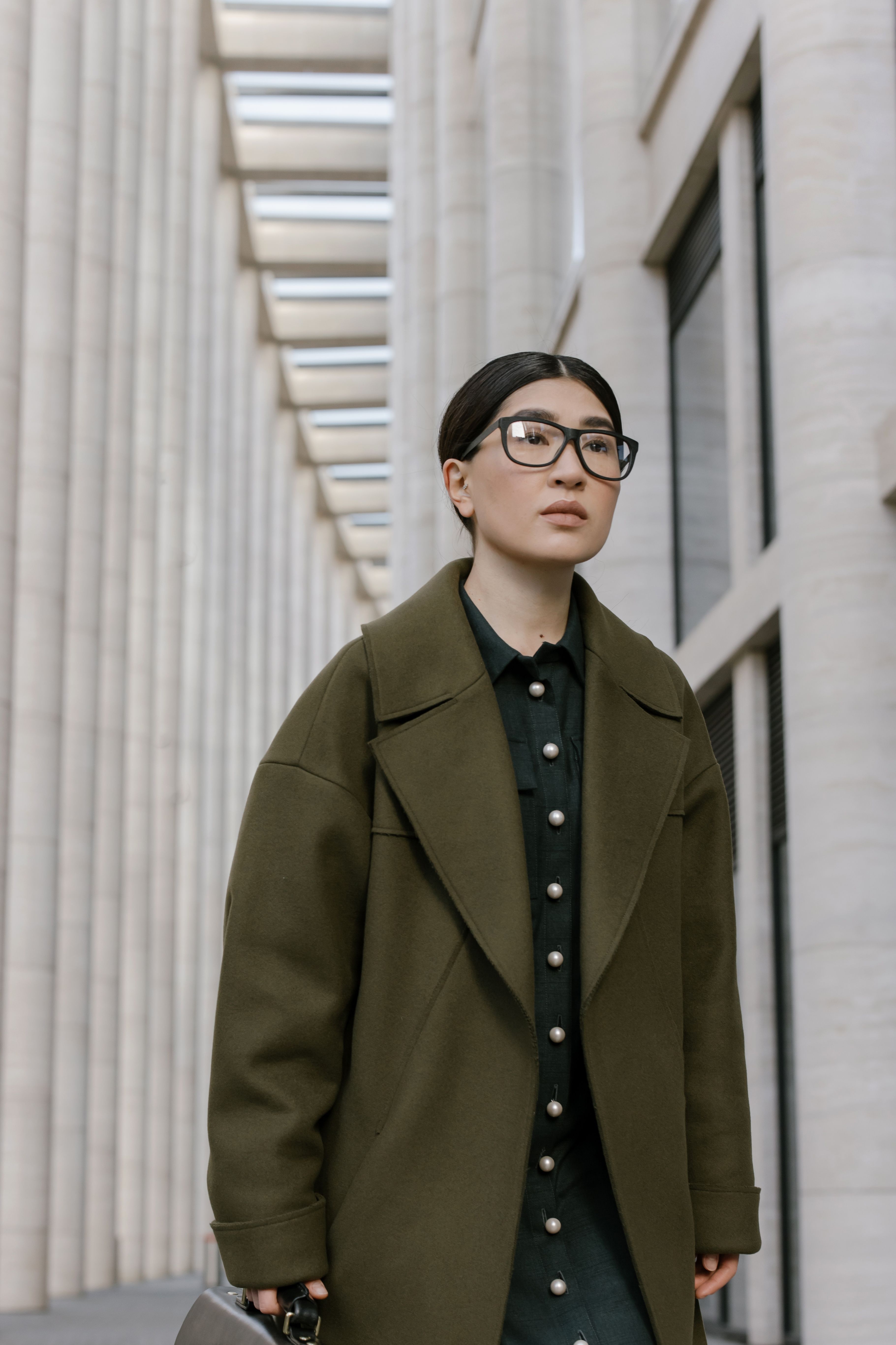 Green wool coat with jeans casual festive