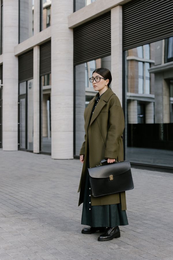 Woman in monochrome navy work outfit