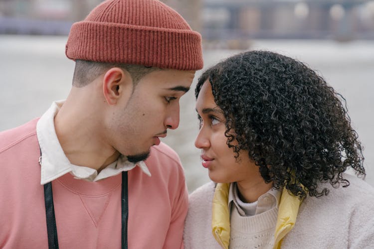 Hispanic Couple Spending Time On Embankment