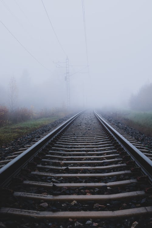 Free Train Railway During a Foggy Day Stock Photo