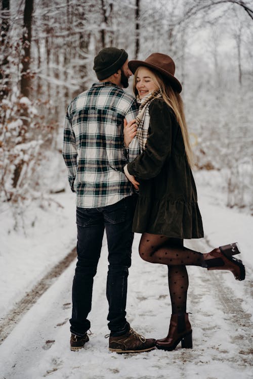 Woman Holding on Man's Arm