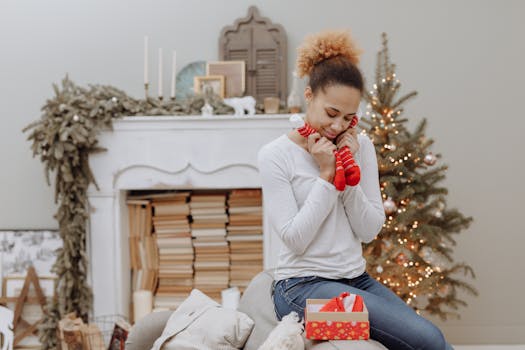 Young woman enjoying a holiday moment with red Christmas socks by the decorated tree.
