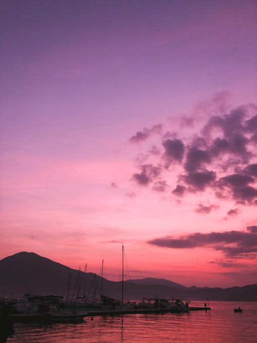Silhouette of Mountain under Pink Sky