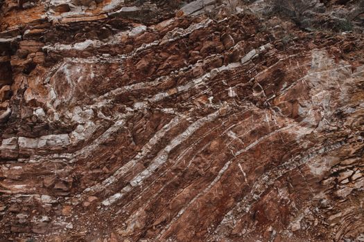 Detailed view of sedimentary rock showcasing erosion and texture patterns.