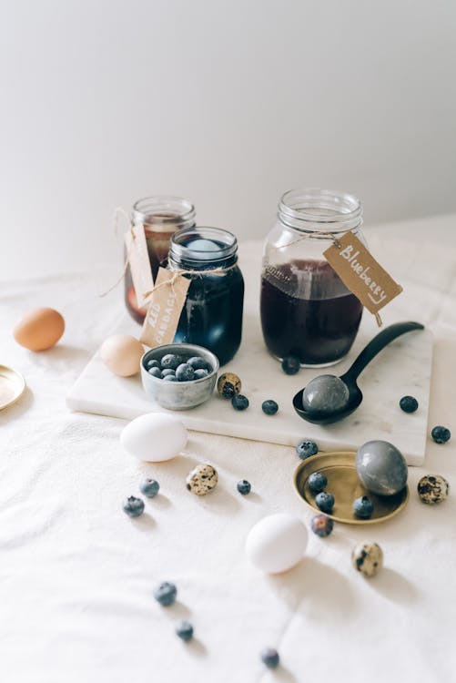 Clear Glass Jar With Black Liquid Inside