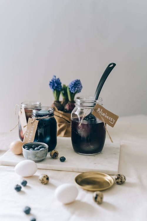 Clear Glass Jars With Black Liquid Inside