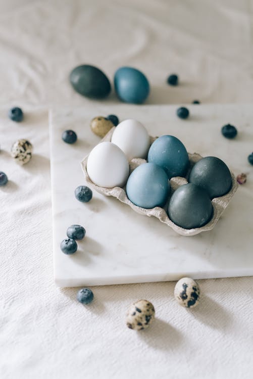 Blue And White Eggs In A Carton