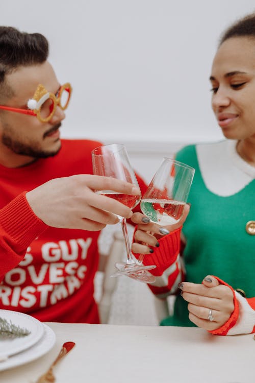 A Couple Holding Champagne Glasses