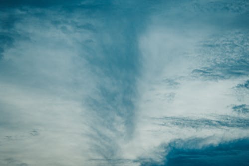 Free Fluffy clouds floating in sky Stock Photo