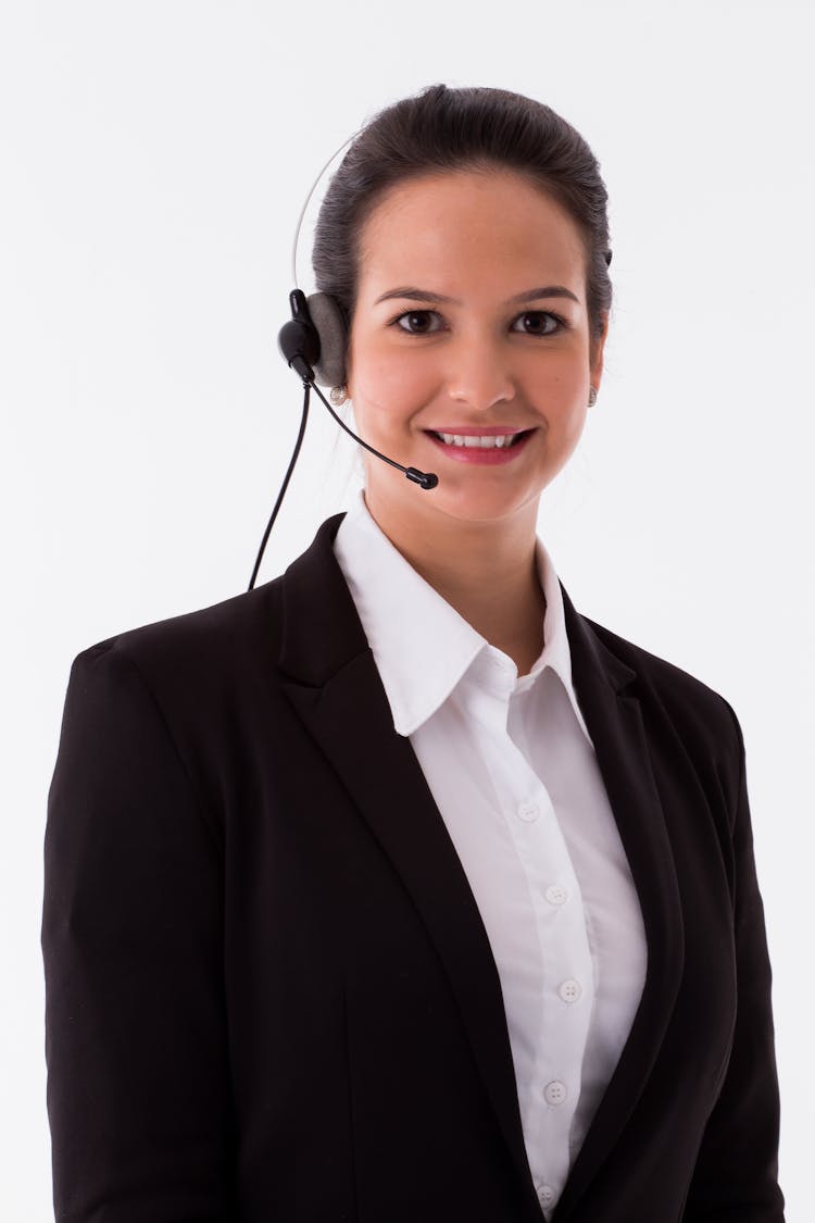 Elegant Businesswoman With A Headset