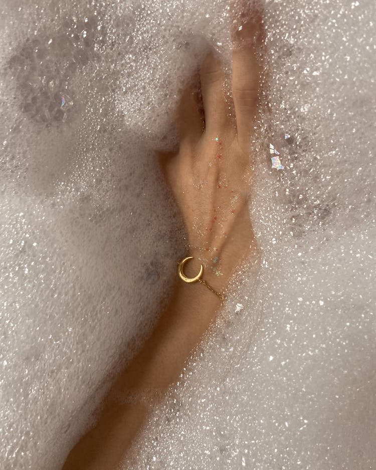 Woman With Bracelet Taking Bath With Foam