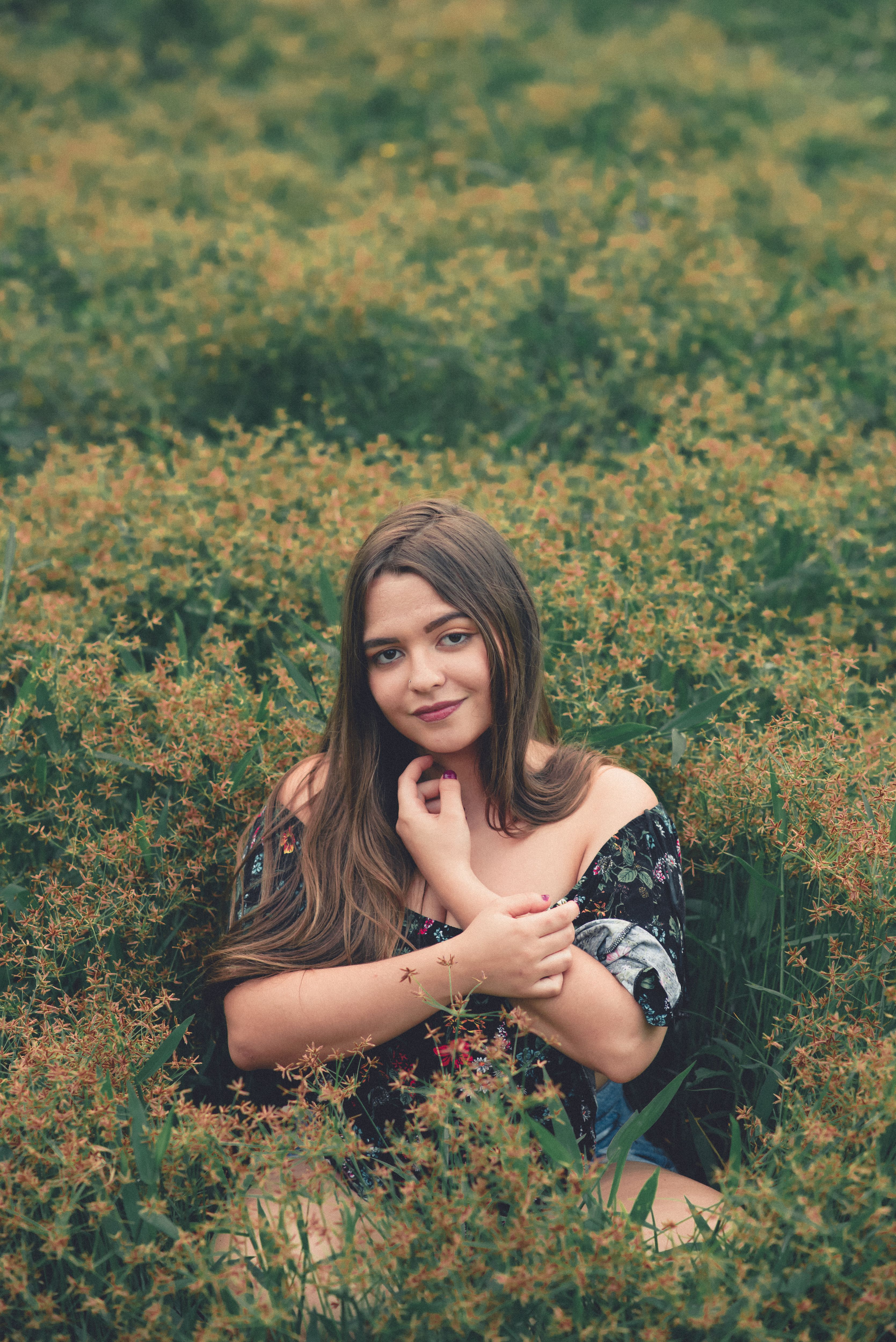 White dress in a wildflower meadow, casual spring style
