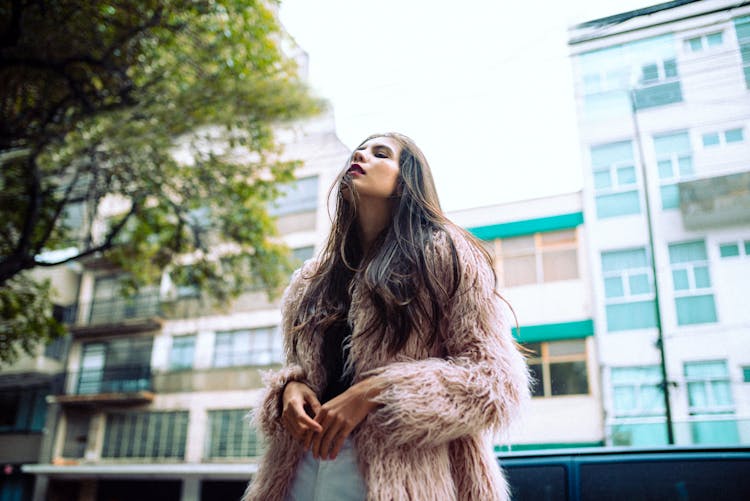 A Woman Wearing A Furry Coat