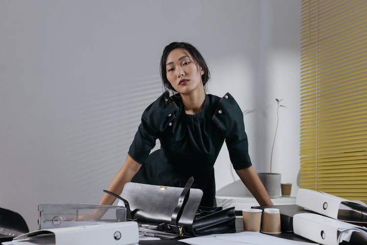 Woman Wearing Black Dress In The Office