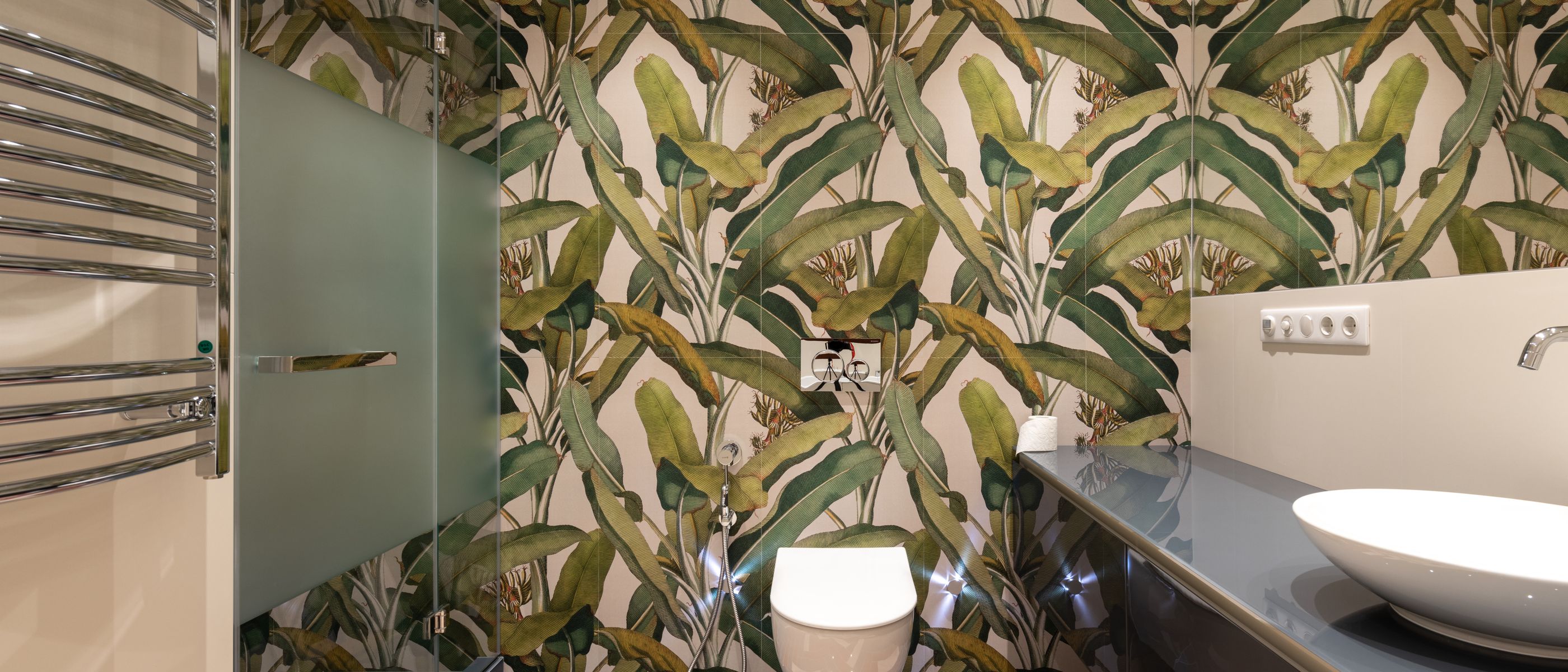Wallpapering in Woolwich — quality trade paint going on in two coats