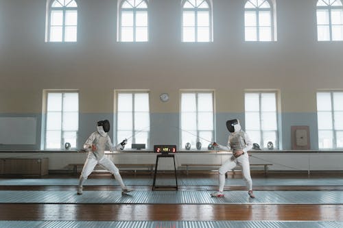 Free Fencers in Action Stock Photo