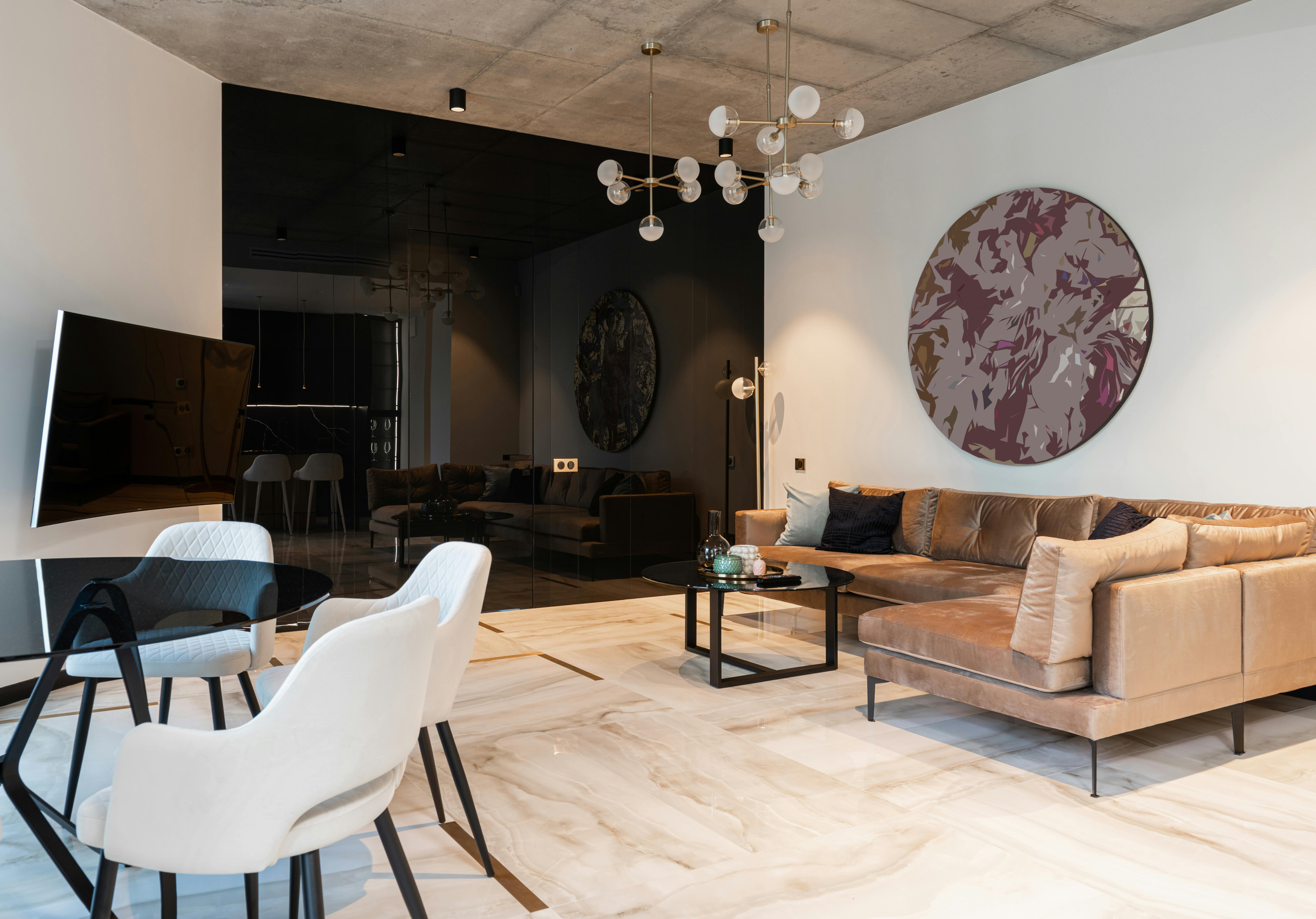 house interior with couch near table and chairs near tv