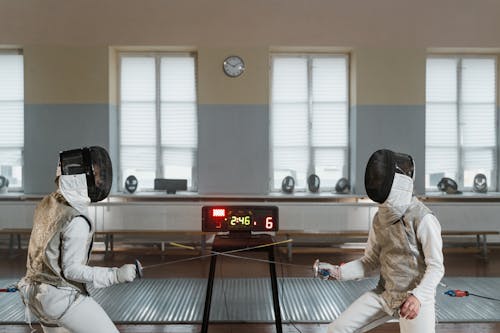 Free Fencers in Competitive Training Stock Photo