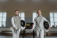 Girls in a Fencing Match