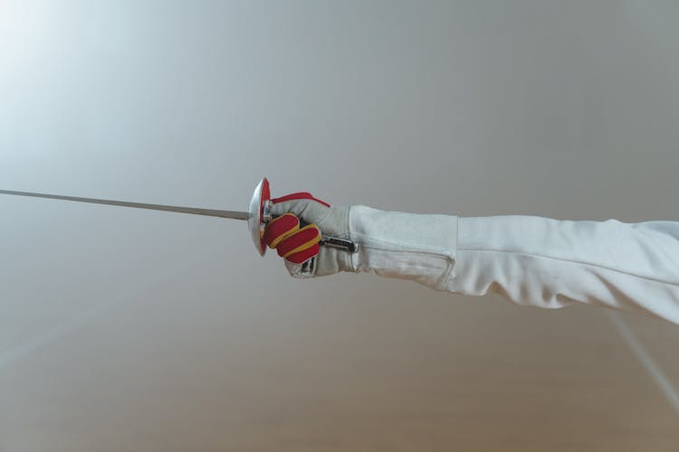 A Fencer Holding An Epee