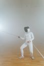 A Fencer with Gears On for Training
