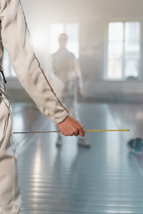 Free A Fencer Holding an Epee Stock Photo