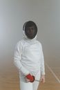 A Woman in Her Fencing Uniform