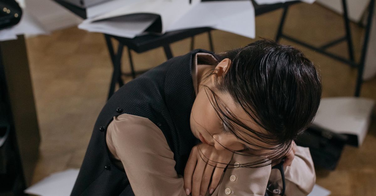A professional looking composed while thinking deeply