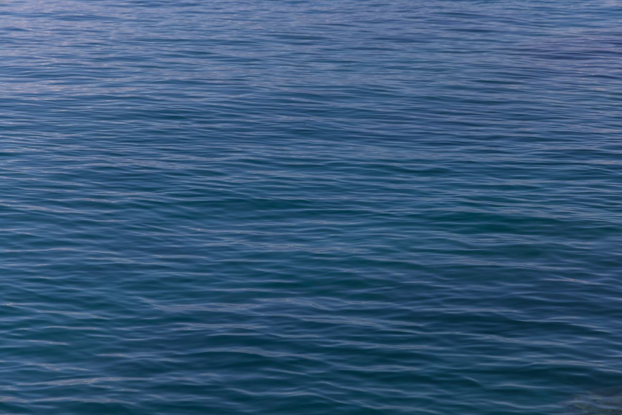 calm ocean waves under soft twilight creating a serene and peaceful am