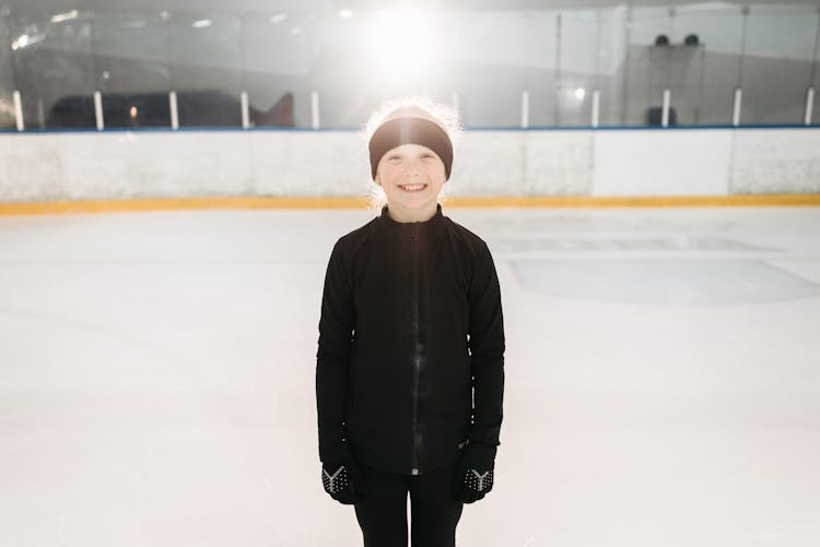 A Pretty Girl In Black Jacket Wearing A Black Sports Headband