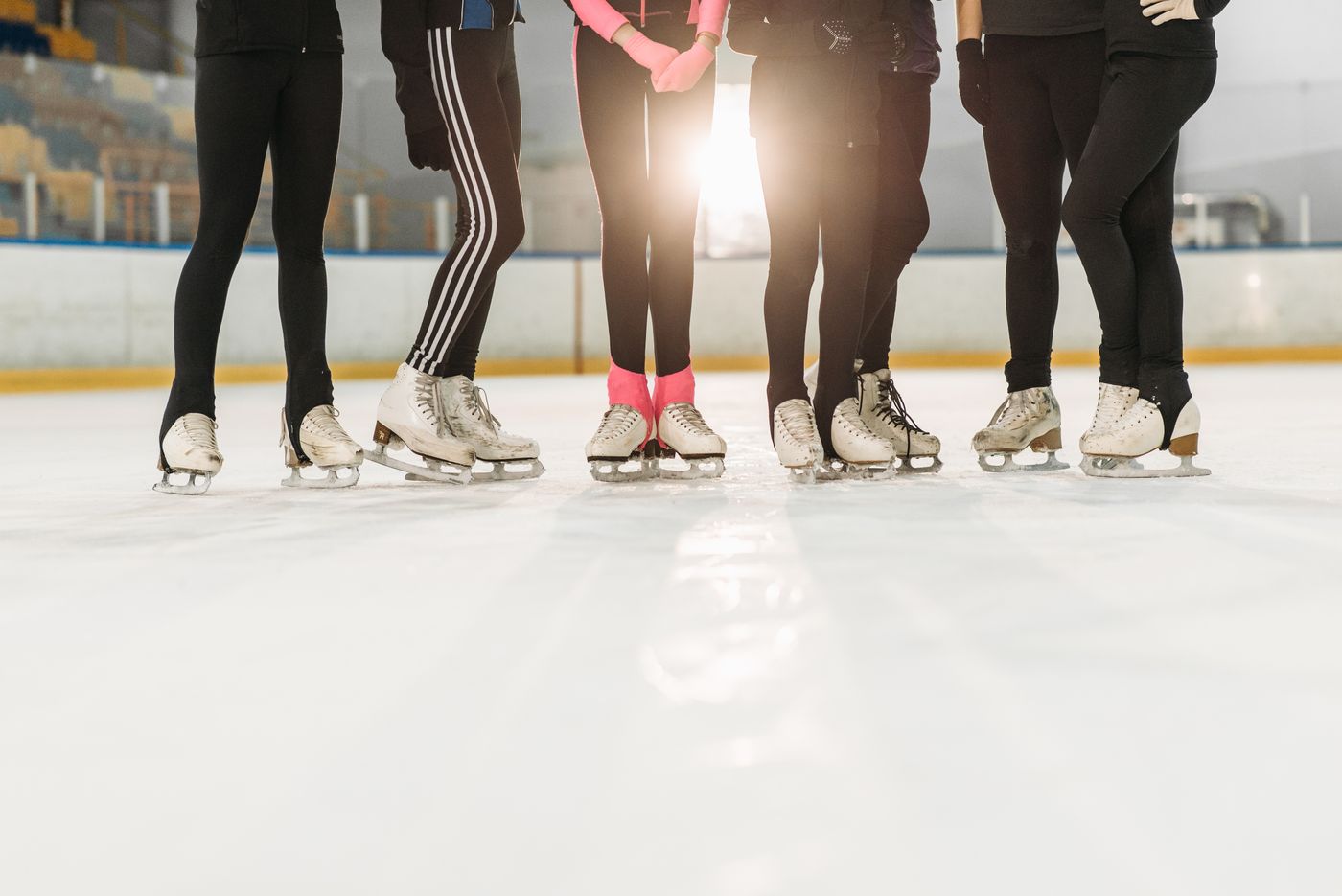 Skater preparing at the rink boards