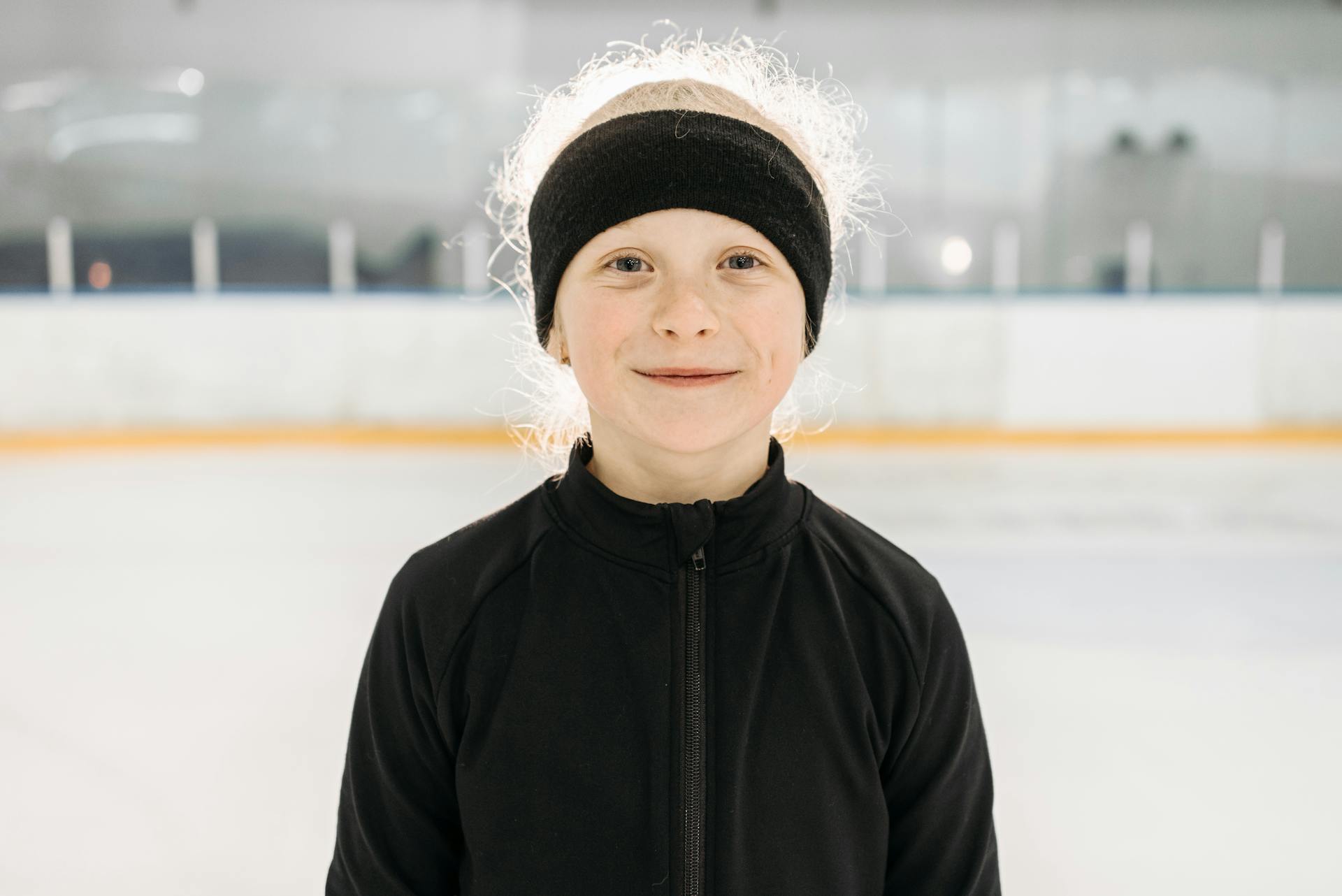 A Pretty Girl in Black Jacket with Black Sports Headband