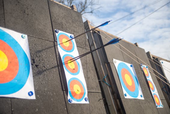 Close-up Photo of Arrows on an Archery Target 